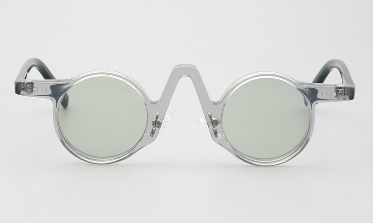 Central | Round Polarized Sunglasses w/ Tortoise Shell Pattern | Retro Raised Bridge Frame Design