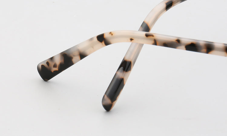 Central | Round Polarized Sunglasses w/ Tortoise Shell Pattern | Retro Raised Bridge Frame Design