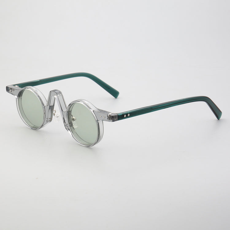 Central | Round Polarized Sunglasses w/ Tortoise Shell Pattern | Retro Raised Bridge Frame Design