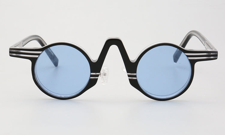 Central | Round Polarized Sunglasses w/ Tortoise Shell Pattern | Retro Raised Bridge Frame Design